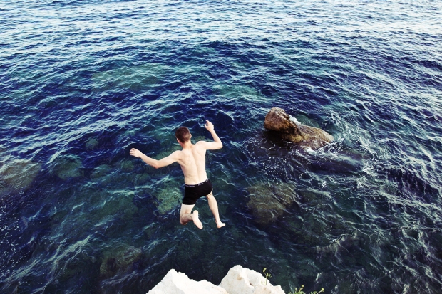 Life-of-Pix-free-stock-photos-jump-people-boy-sea-rock-back-EZE-Joshua-earle